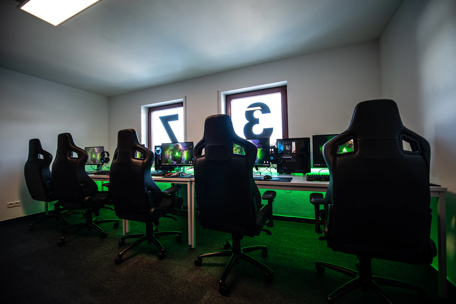 An Australian esports gaming arena lined with consoles and screens